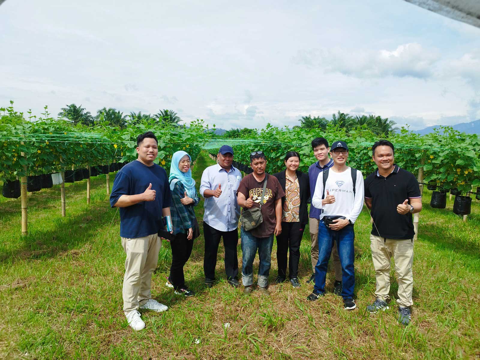 GENM visits the farm of Mr. Iskandar (middle) in Karak, accompanied by Mr. Adrian from Nu Farm Fresh Sdn. Bhd. (far right), as part of our initiative to support local farmers in Pahang.