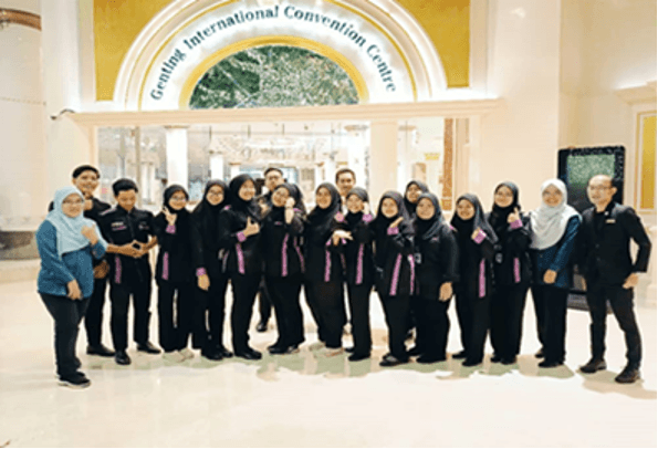Students and lecturers in front of the Genting International Convention Centre during their industrial visit